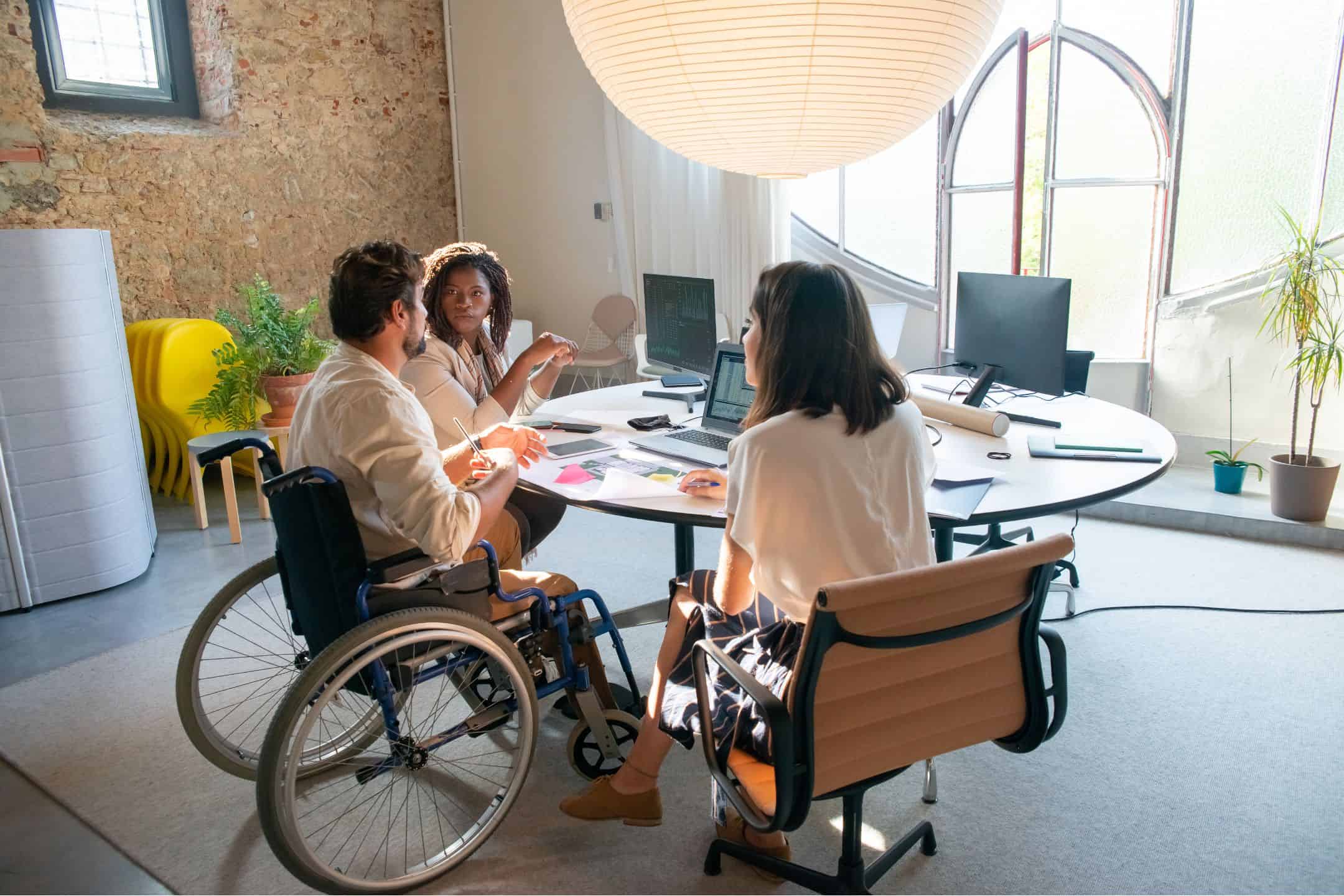 team meeting around table