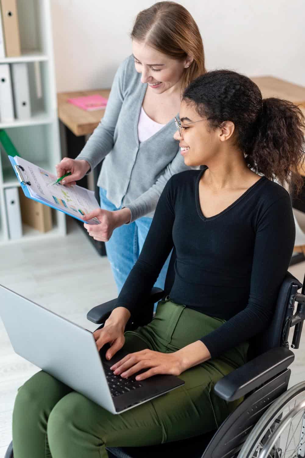lady in wheelchair reading document